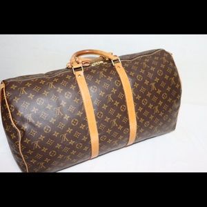 LOUIS VUITTON 
Monogram Keepall 55 Bandolier